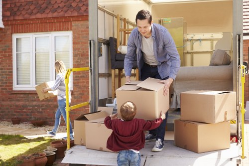 Professional packers organizing household items for a move in Haringey