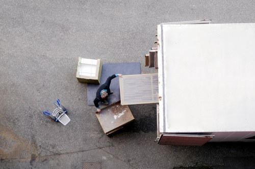 Professional movers handling furniture during a relocation