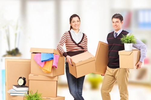 Professional movers assisting with packing in Haringey