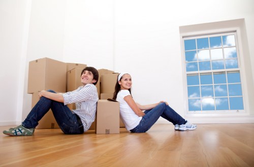 Experienced packers handling delicate and valuable items with care