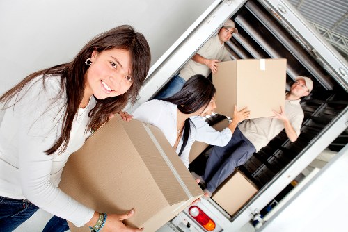 Professional movers loading a truck